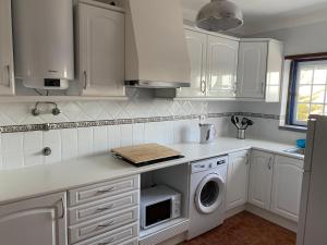 Kuchyň nebo kuchyňský kout v ubytování Ericeira Sand Beach R5
