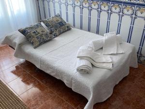 Postel nebo postele na pokoji v ubytování Ericeira Sand Beach R5