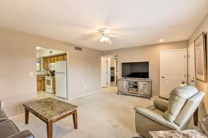 a living room with a couch and a table at Less Than 1 Mi to Golf Home with Screened Porch in Sun City in Sun City West