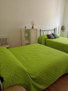 Cama o camas de una habitación en Forte Sangallo Home - PARKING POINT FOR BIKE