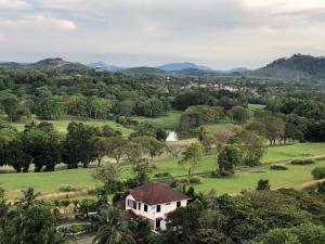 an aerial view of a golf course with a house at Aisis Home at Afamosa in Kampong Alor Gajah