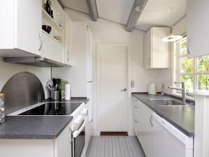 Η κουζίνα ή μικρή κουζίνα στο 5 person holiday home in Vejby-By Traum +39 φωτογραφίες