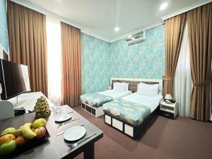 En eller flere senger på et rom på Istanbul Gold Hotel