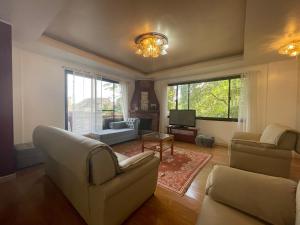 Seating area sa The 1stfloor- Camp John Hay with view