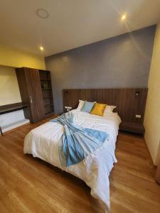 Letto o letti in una camera di Hotel Inti Quito