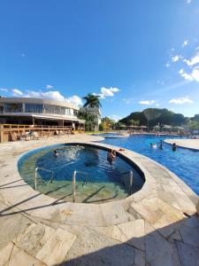 Πισίνα στο ή κοντά στο Lake Side Beira do Lago - piscina - academia - sauna- By Rei dos Flats