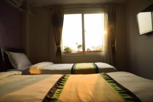 Llit o llits en una habitació de two-bed room in Thamel, peaceful location Kathmandu