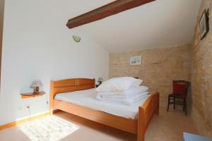 Postel nebo postele na pokoji v ubytování Elma Stay Location La Rétaise