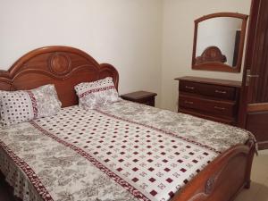 Postel nebo postele na pokoji v ubytování Kakatar Family Residence , Yoff