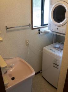 Kylpyhuone majoituspaikassa Guest House Kiyohime