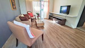 Μια τηλεόραση ή/και κέντρο ψυχαγωγίας στο Fiscus Villa 3 bedrooms with private pool.