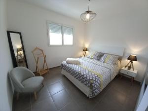 Posteľ alebo postele v izbe v ubytovaní Maison BELIZO, familiale ,calme et reposante.