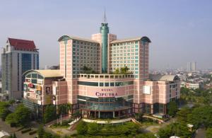 an aerial view of a building in a city at Hotel Ciputra Jakarta managed by Swiss-Belhotel International in Jakarta