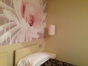 Postel nebo postele na pokoji v ubytování Oreste Suite