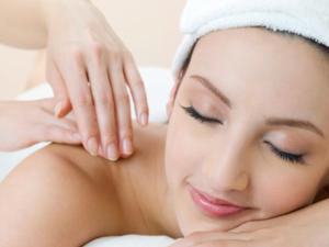 a woman in a spa getting a massage at Silverdown Luxury king rooms OR Apartment in Orange