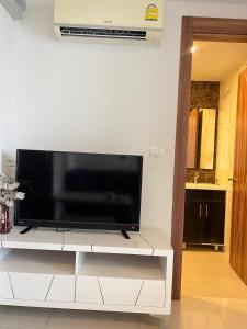 TV a/nebo společenská místnost v ubytování Arcadia 阿卡迪亚水系公寓