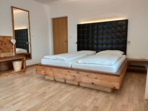 Ένα ή περισσότερα κρεβάτια σε δωμάτιο στο Rebleitenhof