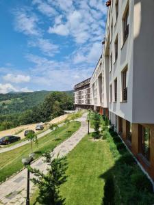 a view from the balcony of a building at Ogy's apartment in Kopaonik