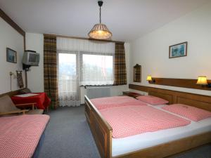 Ein Bett oder Betten in einem Zimmer der Unterkunft Apartments home Hermann, Ramsau am Dachstein