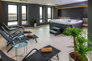 Posezení v ubytování Flow Hotel & Conference
