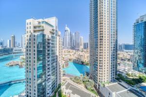 Nespecifikovaný výhled na destinaci Dubaj nebo výhled na město při pohledu z apartmánu