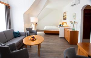 Posezení v ubytování Gasthof zur Post Oberwirt