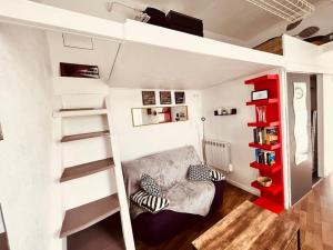 a living room with a couch and a loft bed at Le Jean -Jaures 2 / Charmant P1 bis in Nîmes