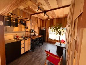 Kuchyň nebo kuchyňský kout v ubytování Guesthouse Shimashima