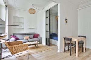 Część wypoczynkowa w obiekcie Appartement Quartier Hotel de Ville Free Netflix