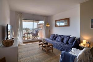 Posedenie v ubytovaní Port Pals, precioso apartamento con vista al mar y piscina