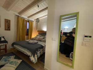 מיטה או מיטות בחדר ב-Perla Marina