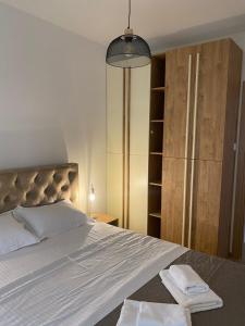 Voodi või voodid majutusasutuse Solaris Apartments toas