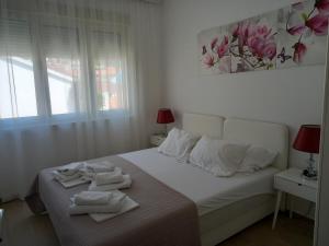 Voodi või voodid majutusasutuse Solaris Apartments toas