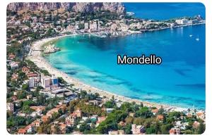 a view of a beach with the words montenegro at BELLA PALERMO in Palermo