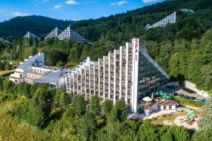 an aerial view of a hotel in the mountains at Hotel Diament Ustroń in Ustroń