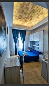 Posteľ alebo postele v izbe v ubytovaní Golfo di Orosei rooms