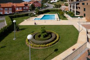 an aerial view of a park with a swimming pool at ISLA LUNA. (familias/parejas) in Isla