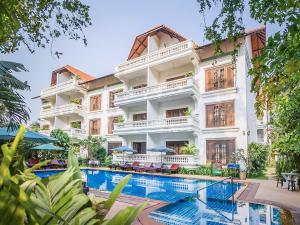 an image of a hotel with a swimming pool at Chateau d'Angkor La Residence in Siem Reap