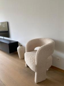 TV a/nebo společenská místnost v ubytování Cosy Apartment near Antwerp