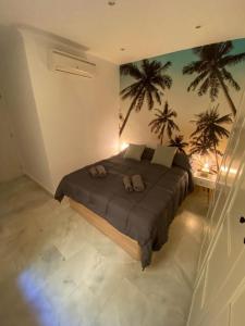 Posteľ alebo postele v izbe v ubytovaní Lovely 1Bedroom Apartment in the Heart of Malaga - WIFI&AC