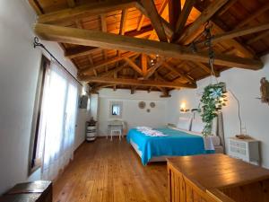 Кровать или кровати в номере Agnanti Villas 1