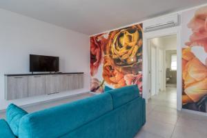 Telewizja i/lub zestaw kina domowego w obiekcie Appartamenti Villa Campo Rosso