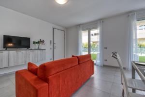 Telewizja i/lub zestaw kina domowego w obiekcie Appartamenti Villa Campo Rosso
