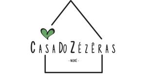 un logo per lettere casablanca con cuore di Casa do Zézêras a Nazaré