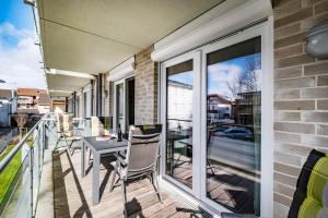 Ein Balkon oder eine Terrasse in der Unterkunft Haus Deichkieker Apartment 1 4