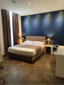 Postel nebo postele na pokoji v ubytování Hotel Up Wellness & Spa