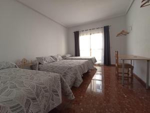 Posteľ alebo postele v izbe v ubytovaní Vivienda Agustín Durán