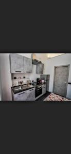Kuchyňa alebo kuchynka v ubytovaní Golfo di Orosei rooms
