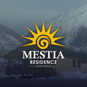 een teken voor een mesa veerkracht conferentie op een gebouw bij Mestia Residence in Mestia