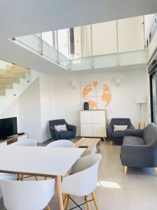 Televízia a/alebo spoločenská miestnosť v ubytovaní Villa Bali 3034